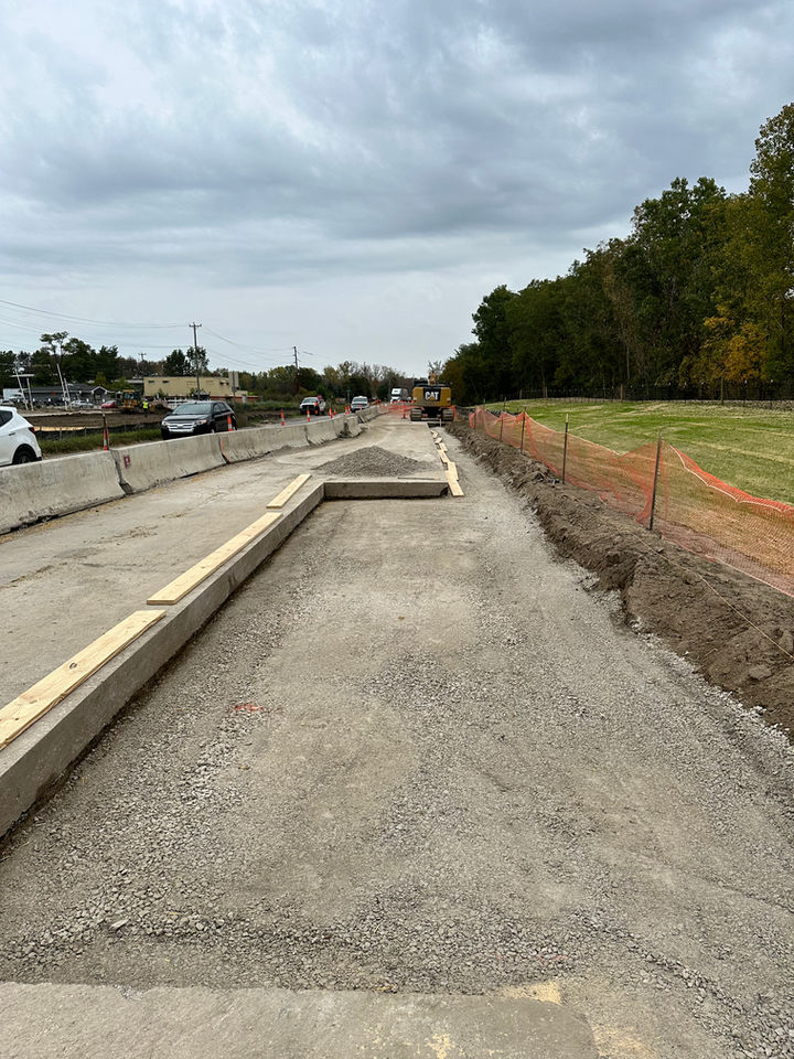 Road Base & Curb Work by Prime Construction and Excavation